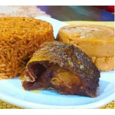 Jollof rice with moi-moi & croaker