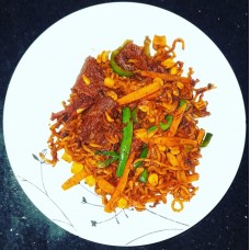 Indomie, shredded suya, sausage and egg 